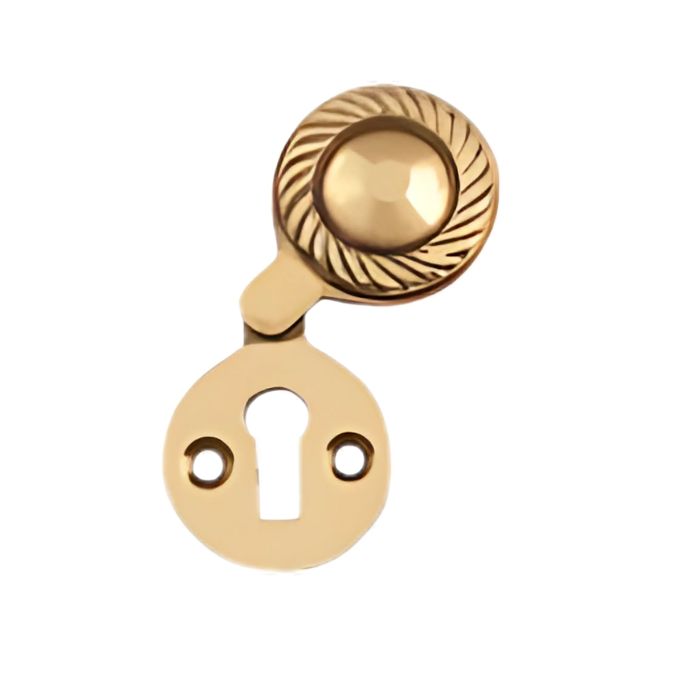 BRASS GEORGIAN COVERED ESCUTCHEON